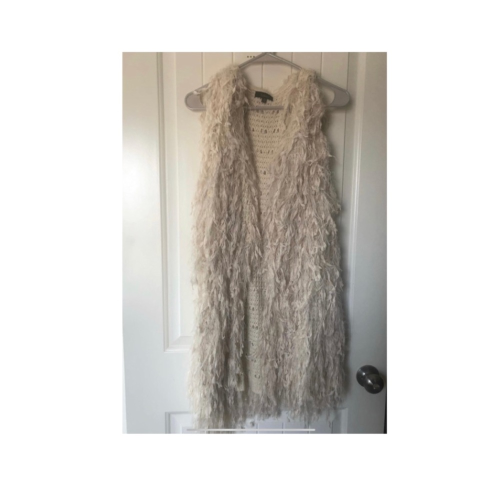 Brand New waist length vest